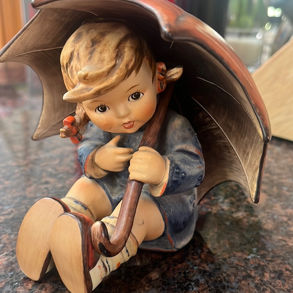 Hummel Umbrella Boy and Umbrella Girl. Beautiful